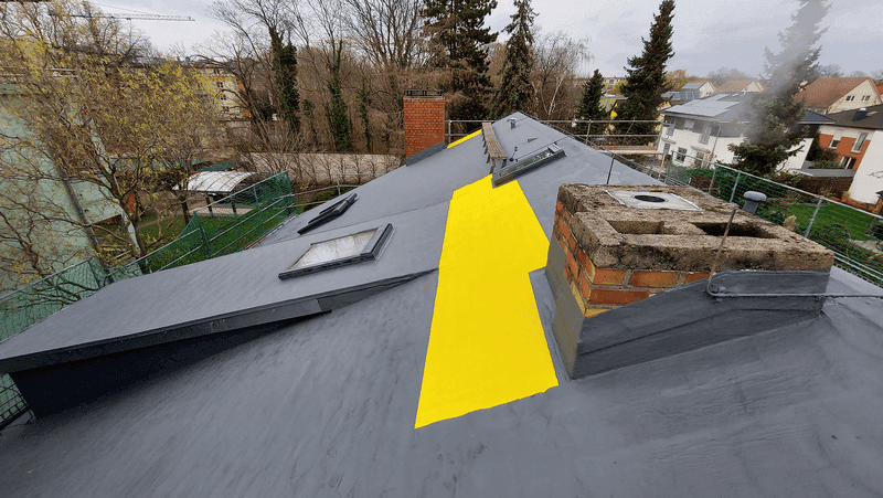 Renovation of a gable roof in Berlin using Triflex ProTect liquid polymer as a roof waterproofing system.